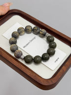 The Remedy Strand Black Gold Sparkle Glass Bracelet – 12mm Relaxation Beads